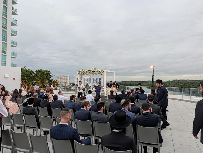 Rooftop chuppah ceremony with Miami skyline