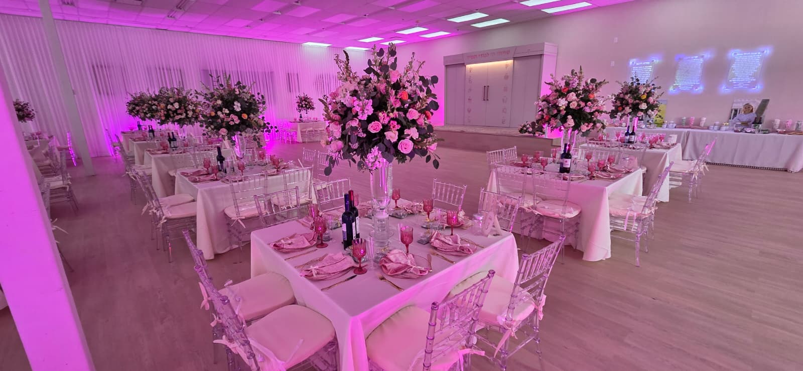 Florals and chuppah-facing tables at the Israeli Center