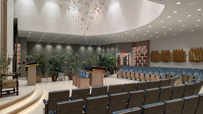 SIB JCC sanctuary with chandelier and tiered seating