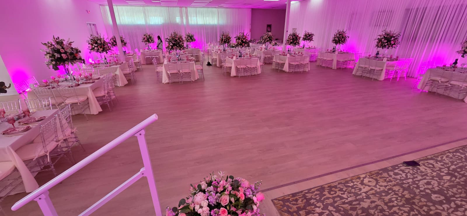 Dance floor and tablescape with uplighting